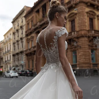 Елегантни и модерни дантелени апликации Сватбени рокли 2022 с ръкави-капачки Рокли за булката с отворен гръб копчета Тюл Сватбени рокли Vestido De Новия